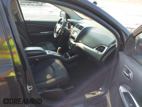 2013 Dodge Journey SE with VIN 3C4PDCAB9DT561701, listed as a IAAI auction lot 42403322 with 143,766 mi miles and . Bid and sale history available at DreamBid. Image 5.