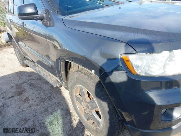 2011 Jeep Grand Cherokee Laredo with VIN 1J4RR4GG2BC670264, listed as a IAAI auction lot 41670045 with 252,044 mi miles. Bid and sale history available at carsss.com. Image 6.