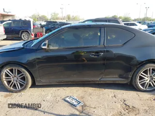 2013 Scion tC with VIN JTKJF5C77D3050609, listed as a IAAI auction lot 41872911 with 197,531 mi miles. Bid and sale history available at carsss.com. Image 15.
