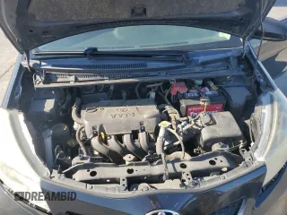 2012 Toyota Yaris L z VIN JTDKTUD35CD515441, wystawiony jako Copart lot #58772585 z przebiegiem 143 959 mil mil oraz Szkoda całkowita • Salvage title. Historia ofert i sprzedaży dostępna na DreamBid. Obrazek 11.