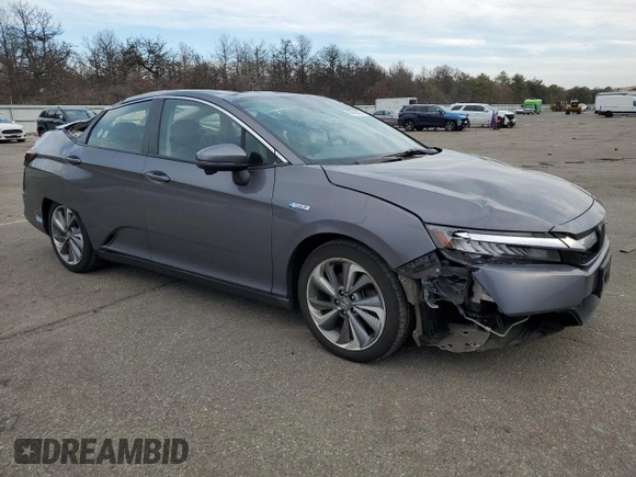 2018 Honda Clarity with VIN JHMZC5F19JC016997, listed as a Copart auction lot 46618465 with 90,038 mi miles and Salvage Title. Bid and sale history available at DreamBid. Image 4.