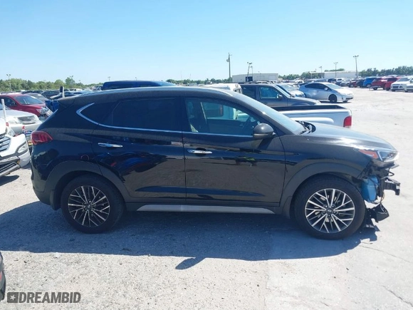 2021 Hyundai Tucson Limited with VIN KM8J33AL9MU305948, listed as a IAAI auction lot 41834956 with 100,098 mi miles. Bid and sale history available at carsss.com. Image 13.