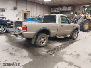 1999 Ford Ranger XLT with VIN 1FTYR11X0XTA72917, listed as a IAAI auction lot 41502156 with 106,585 mi miles. Bid and sale history available at carsss.com. Image 4.