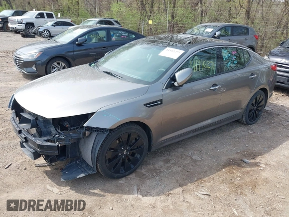 2012 Kia Optima SX with VIN 5XXGR4A62CG010028, listed as a IAAI auction lot 41942271 with 227,080 mi miles and . Bid and sale history available at carsss.com. Image 2.