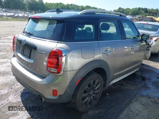 2018 MINI Countryman Cooper S with VIN WMZYT5C37J3E59574, listed as a IAAI auction lot 42534496 with 51,347 mi miles and . Bid and sale history available at DreamBid. Image 4.