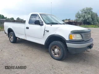 2000 Ford F-150 XL with VIN 1FTRF18W8YKB11836, listed as a IAAI auction lot 42728813 with Not provided miles and . Bid and sale history available at DreamBid. Image 1.