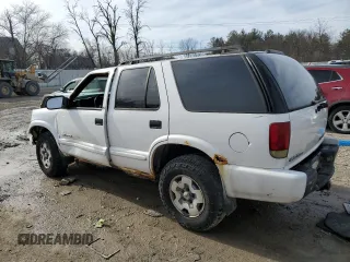 2003 Chevrolet Blazer LS z VIN 1GNDT13X53K143582, wystawiony jako Copart lot #43218675 z przebiegiem 182 827 mil mil oraz Szkoda całkowita • Salvage title. Historia ofert i sprzedaży dostępna na DreamBid. Obrazek 2.