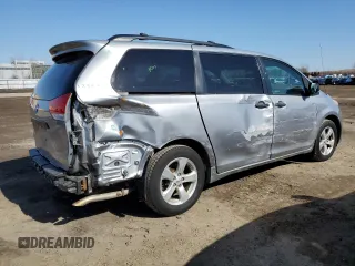 2014 Toyota Sienna L with VIN 5TDZK3DC9ES476369, listed as a Copart auction lot 48244165 with 123,574 mi miles and Salvage Title. Bid and sale history available at carsss.com. Image 3.