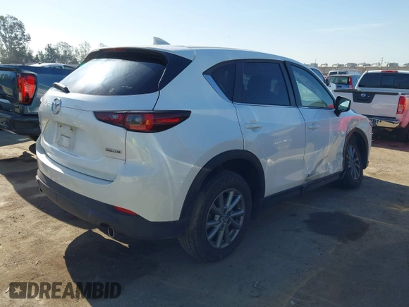 2022 Mazda CX-5 S Preferred with VIN JM3KFBCM2N0630148, listed as a IAAI auction lot 41986351 with 45,664 mi miles and . Bid and sale history available at carsss.com. Image 4.