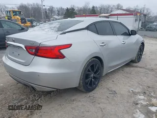 2018 Nissan Maxima SV with VIN 1N4AA6AP7JC380038, listed as a IAAI auction lot 41228603 with 135,067 mi miles and . Bid and sale history available at DreamBid. Image 4.