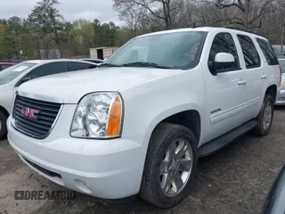 2013 GMC Yukon SLT with VIN 1GKS1CE00DR225296, listed as a IAAI auction lot 41854049 with 241,437 mi miles. Bid and sale history available at carsss.com. Image 2.