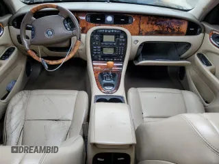 2006 Jaguar XJ with VIN SAJWA79B76SH08803, listed as a Copart auction lot 40268774 with 0 mi miles and Salvage Title. Bid and sale history available at carsss.com. Image 8.