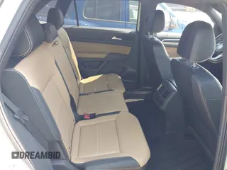 2022 Volkswagen Atlas SE z VIN 1V2HE2CA5NC225233, wystawiony jako IAAI lot #42366811 z przebiegiem 27 986 mil mil oraz . Historia ofert i sprzedaży dostępna na DreamBid. Obrazek 8.