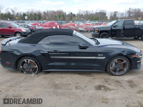 2021 Ford Mustang GT Premium with VIN 1FATP8FF4M5143096, listed as a IAAI auction lot 42013344 with 20,221 mi miles and . Bid and sale history available at DreamBid. Image 13.