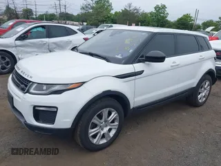 2016 Land Rover Range Rover Evoque SE z VIN SALVP2BG2GH085063, wystawiony jako IAAI lot #42337615 z przebiegiem 99 391 mil mil oraz . Historia ofert i sprzedaży dostępna na DreamBid. Obrazek 2.