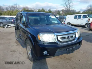 2011 Honda Pilot EX with VIN 5FNYF4H42BB074895, listed as a IAAI auction lot 41215003 with 131,507 mi miles. Bid and sale history available at carsss.com. Image 1.