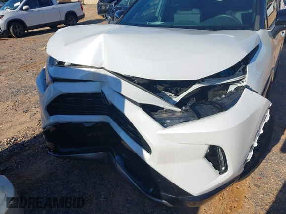 2023 Toyota RAV4 Hybrid XSE with VIN 2T3E6RFV1PW038080, listed as a IAAI auction lot 42518107 with 14,430 mi miles and . Bid and sale history available at DreamBid. Image 6.
