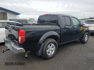2011 Nissan Frontier Pro-4X with VIN 1N6AD0EV0BC434477, listed as a Copart auction lot 63703525 with 233,423 mi miles and Clean title. Bid and sale history available at DreamBid. Image 3.