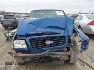 2009 Ford Ranger XLT with VIN 1FTZR45E99PA02617, listed as a IAAI auction lot 41508620 with 127,331 mi miles. Bid and sale history available at carsss.com. Image 13.