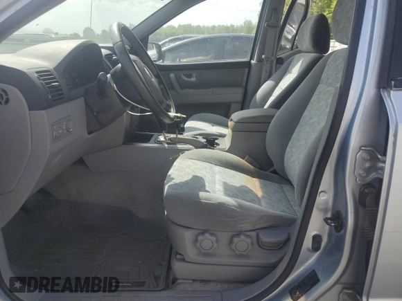 2005 Kia Sorento LX with VIN KNDJC733955478664, listed as a Copart auction lot 55295185 with 61,058 mi miles and Clean Title. Bid and sale history available at DreamBid. Image 7.