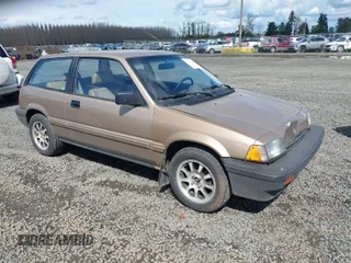 1986 Honda Civic z VIN JHMAH5325GS018658, wystawiony jako IAAI lot #41946339 z przebiegiem 69 518 mil mil oraz . Historia ofert i sprzedaży dostępna na DreamBid. Obrazek 1.