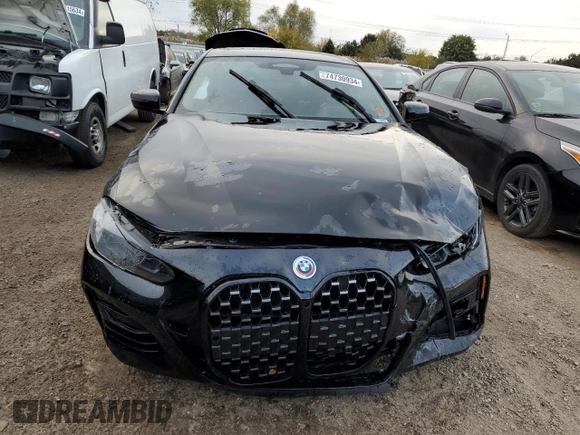 2023 BMW 4 Series M440i xDrive with VIN WBA13AR09PCM73339, listed as a Copart auction lot 74730934 with 13,704 mi miles and Salvage Title. Bid and sale history available at DreamBid. Image 5.