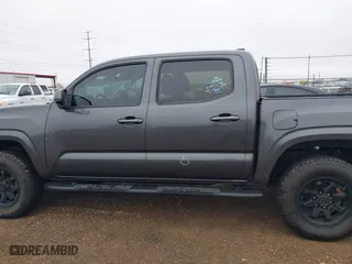 2023 Toyota Tacoma 4WD SR with VIN 3TYCZ5AN5PT157657, listed as a IAAI auction lot 41412536 with 12,828 mi miles. Bid and sale history available at carsss.com. Image 15.