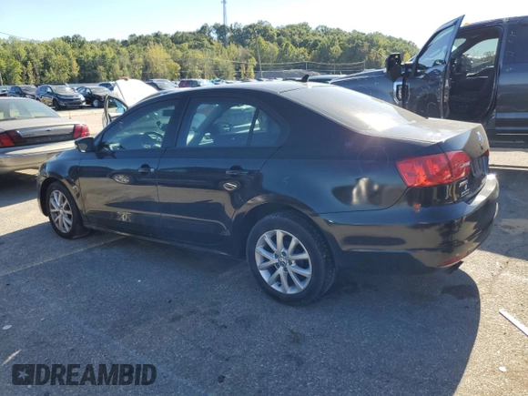 2011 Volkswagen Jetta SE with VIN 3VWDX7AJ2BM013018, listed as a Copart auction lot 73686974 with 145,557 mi miles and Salvage title. Bid and sale history available at DreamBid. Image 2.