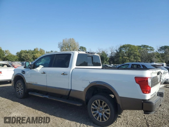 2017 Nissan Titan XD PRO-4X with VIN 1N6BA1F44HN541022, listed as a Copart auction lot 73966134 with 66,582 mi miles and Salvage Title. Bid and sale history available at carsss.com. Image 2.