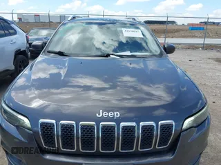 2021 Jeep Cherokee Latitude Lux with VIN 1C4PJMMX0MD235006, listed as a IAAI auction lot 42230915 with 76,264 mi miles and . Bid and sale history available at DreamBid. Image 6.