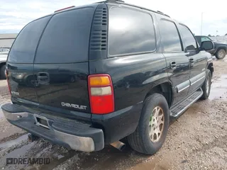 2003 Chevrolet Tahoe LT with VIN 1GNEC13Z83R264751, listed as a IAAI auction lot 41898933 with 300,977 mi miles. Bid and sale history available at carsss.com. Image 4.