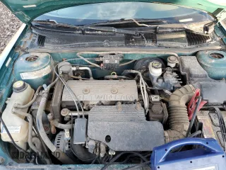 1997 Pontiac Sunfire SE z VIN 1G2JB12T9V7579374, wystawiony jako Copart lot #41468144 z przebiegiem 153 533 mil mil oraz Tytuł czysty. Historia ofert i sprzedaży dostępna na DreamBid. Obrazek 11.