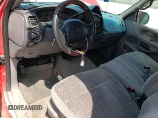 1998 Ford F-150 with VIN 1FTZX1761WKA53404, listed as a Copart auction lot 80628524 with 253,399 mi miles and Salvage title. Bid and sale history available at DreamBid. Image 8.