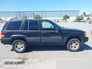 1997 Jeep Grand Cherokee Limited z VIN 1J4GZ78Y3VC683674, wystawiony jako IAAI lot #42331984 z przebiegiem 227 226 mil mil oraz . Historia ofert i sprzedaży dostępna na DreamBid. Obrazek 13.