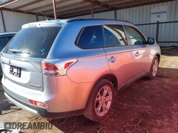 2015 Mitsubishi Outlander SE with VIN JA4AD3A34FZ011259, listed as a IAAI auction lot 41290830 with 88,147 mi miles and . Bid and sale history available at DreamBid. Image 4.
