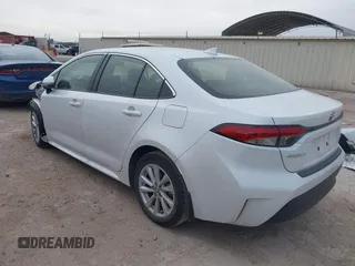 2024 Toyota Corolla Hybrid LE with VIN JTDBCMFE4R3045299, listed as a IAAI auction lot 41283042 with 13,649 mi miles. Bid and sale history available at carsss.com. Image 3.