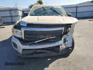 2019 GMC Canyon 2WD with VIN 1GTG5BEA1K1187730, listed as a Copart auction lot 77420574 with 103,127 mi miles and Salvage Title. Bid and sale history available at carsss.com. Image 5.
