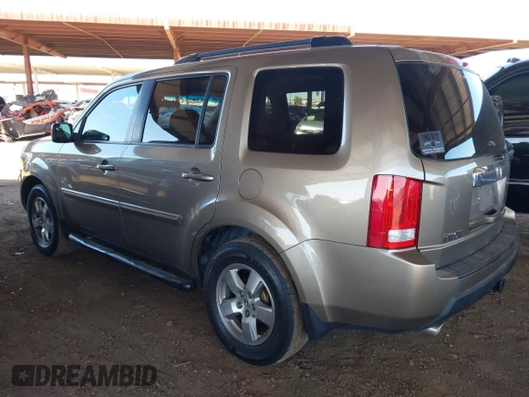 2011 Honda Pilot EX with VIN 5FNYF3H4XBB028225, listed as a IAAI auction lot 41873192 with 155,556 mi miles and . Bid and sale history available at carsss.com. Image 3.