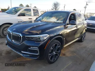 2021 BMW X5 xDrive40i with VIN 5UXCR6C08M9D76272, listed as a IAAI auction lot 41219782 with 56,599 mi miles and . Bid and sale history available at DreamBid. Image 2.
