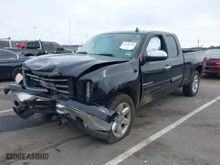 2013 GMC Sierra 1500 SLE with VIN 1GTR2VE79DZ273377, listed as a IAAI auction lot 41620786 with 154,563 mi miles. Bid and sale history available at carsss.com. Image 2.
