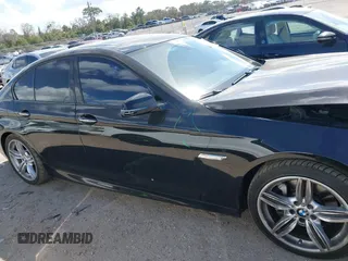 2014 BMW 5 Series 535d with VIN WBAXA5C58ED690447, listed as a IAAI auction lot 41577468 with 149,080 mi miles and . Bid and sale history available at carsss.com. Image 14.