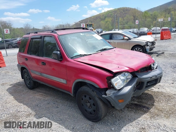 2000 Honda CR-V LX with VIN JHLRD184XYC010847, listed as a IAAI auction lot 42080100 with 256,678 mi miles and . Bid and sale history available at DreamBid. Image 1.