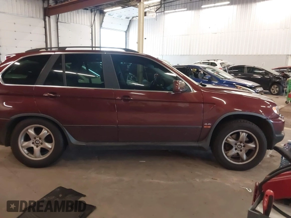 2001 BMW X5 4.4i with VIN WBAFB33561LH24532, listed as a IAAI auction lot 41611503 with 188,671 mi miles. Bid and sale history available at carsss.com. Image 14.