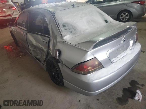 2006 Mitsubishi Lancer with VIN JA3AJ66F46U057530, listed as a Copart auction lot 87750605 with 180,243 mi miles and Salvage Title. Bid and sale history available at DreamBid. Image 2.