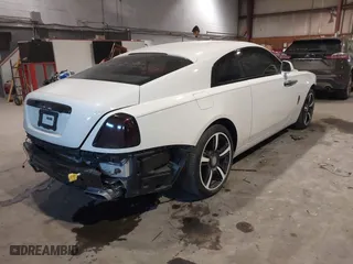 2014 Rolls-Royce Wraith with VIN SCA665C59EUX84389, listed as a IAAI auction lot 41413368 with 57,951 mi miles. Bid and sale history available at carsss.com. Image 4.