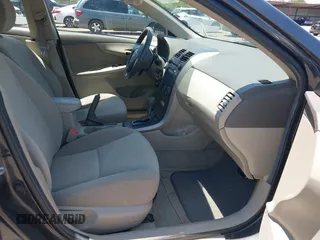 2009 Toyota Corolla with VIN 2T1BU40E69C165005, listed as a IAAI auction lot 42647087 with 150,587 mi miles and . Bid and sale history available at DreamBid. Image 5.