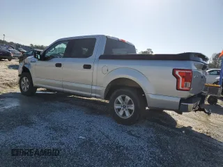 2015 Ford F-150 XLT with VIN 1FTEW1C88FKD74865, listed as a Copart auction lot 48251125 with 215,845 mi miles and Salvage Title. Bid and sale history available at carsss.com. Image 2.