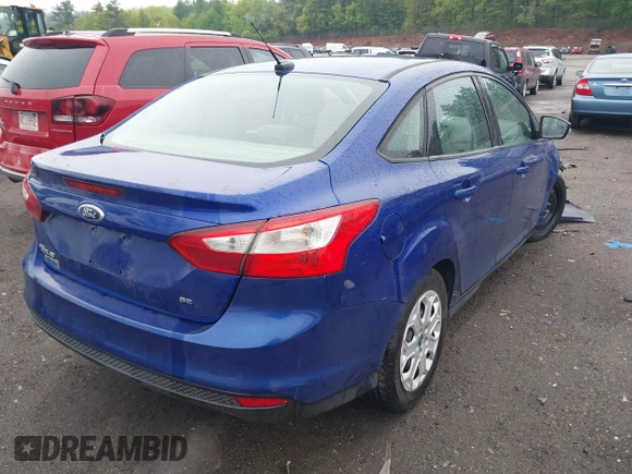 2012 Ford Focus SE with VIN 1FAHP3F23CL345654, listed as a IAAI auction lot 42231539 with 77,360 mi miles and . Bid and sale history available at DreamBid. Image 4.