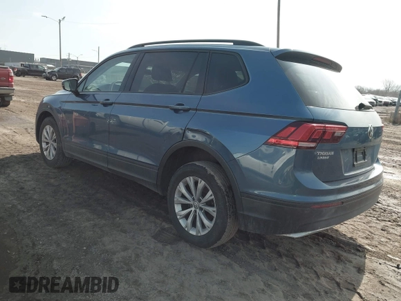 2018 Volkswagen Tiguan S with VIN 3VV1B7AX6JM108786, listed as a IAAI auction lot 41708099 with 162,289 mi miles and . Bid and sale history available at DreamBid. Image 3.