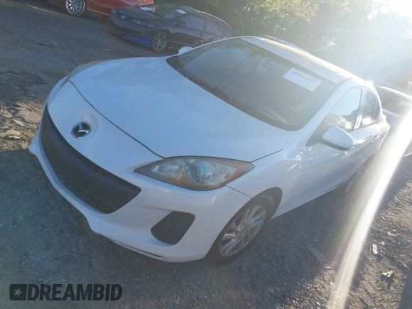 2012 Mazda 3 i Touring z VIN JM1BL1V78C1655923, wystawiony jako IAAI lot #42032857 z przebiegiem 164 495 mil mil oraz . Historia ofert i sprzedaży dostępna na DreamBid. Obrazek 2.